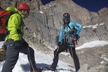 A Colorado Mountain School guide familiarizes a client with mountaineering equipment in the stunning Chasm Lake Cirque in Rocky Mountain National Park. (Photograph by Colorado Mountain School)