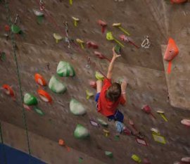 Kids climbing at Boston Rock Gym indoor summer camp
