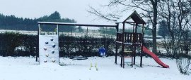 Kids climbing frame in the snow